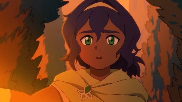 Trailer frame: close-up of a startled Pavi between dark rock pillars