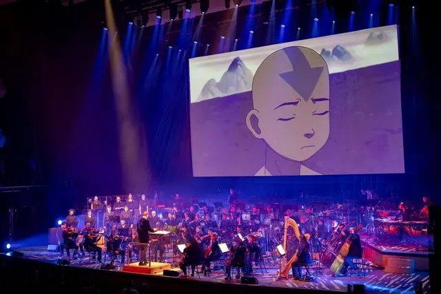 Avatar: The Last Airbender in Concert world premiere at Royal Festival Hall, London: orchestra performing beneath a screen showing Aang meditating
