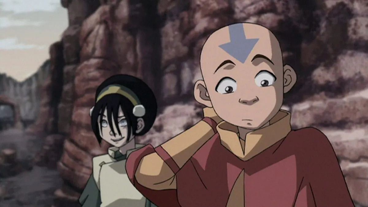 Episode still, 'Bitter Work' (Book Two): Toph and a sheepish Aang during earthbending training in a canyon
