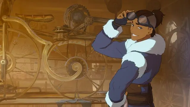 First-look still of adult Sokka (Roman Zaragoza) lifting his goggles in an inventor's workshop