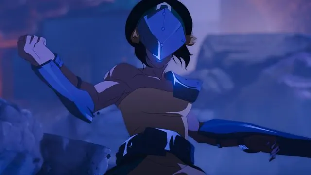 First-look still of adult Toph in a metal mask with armored gauntlets, striking a fighting pose amid rubble