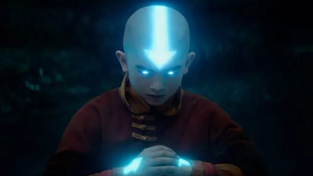 Season 1 still: Aang with glowing arrow and eyes in the Avatar State