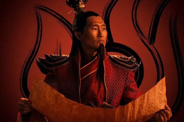 Season 1 character portrait: Daniel Dae Kim as Fire Lord Ozai reading a scroll