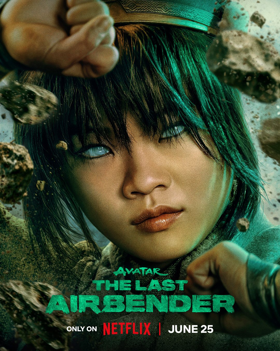 Season 2 character poster: close-up of Miya Cech as Toph Beifong with floating rocks