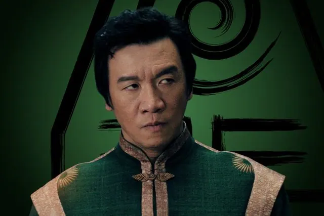 Season 2 character portrait: Chin Han as Long Feng in green and gold in front of the Earth Kingdom emblem