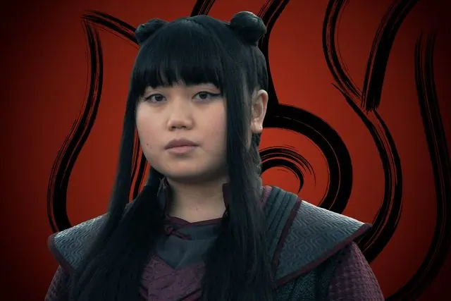 Season 2 character portrait: Momona Tamada as Ty Lee in front of the Fire Nation emblem