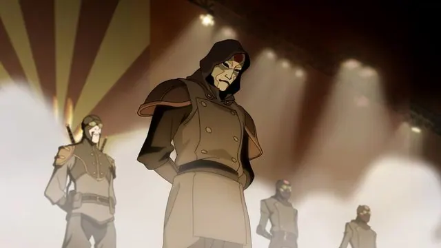 Book One still: masked Amon on stage at an Equalist rally under spotlights, with his lieutenant